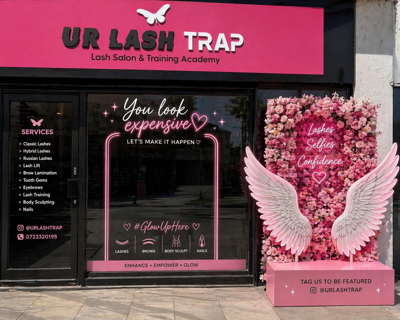 The angel wings selfie wall outside UR LASH TRAP